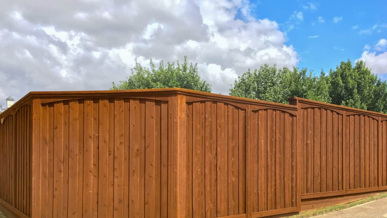 Charleston fence company dark stained wood fence