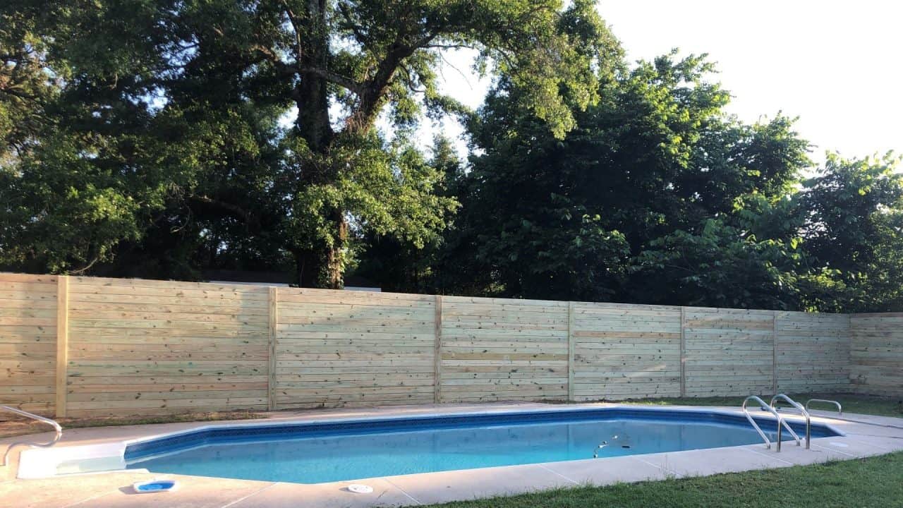 Wood fence near a pool